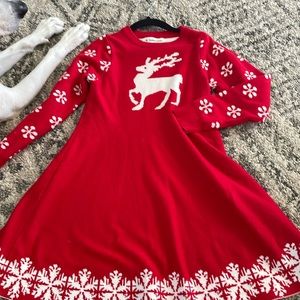 Red sweater holiday dress (size 7/8) runs large. Good used condition.